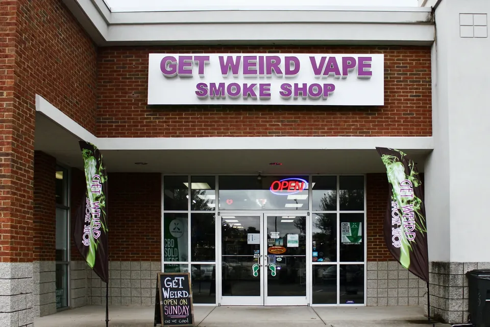 Get Weird Vape Smoke Shop storefront with open sign on North Main Street in Anderson